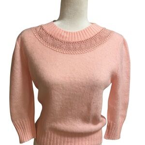 - Cozy Vintage Pink Sweater with Embroidered Neckline